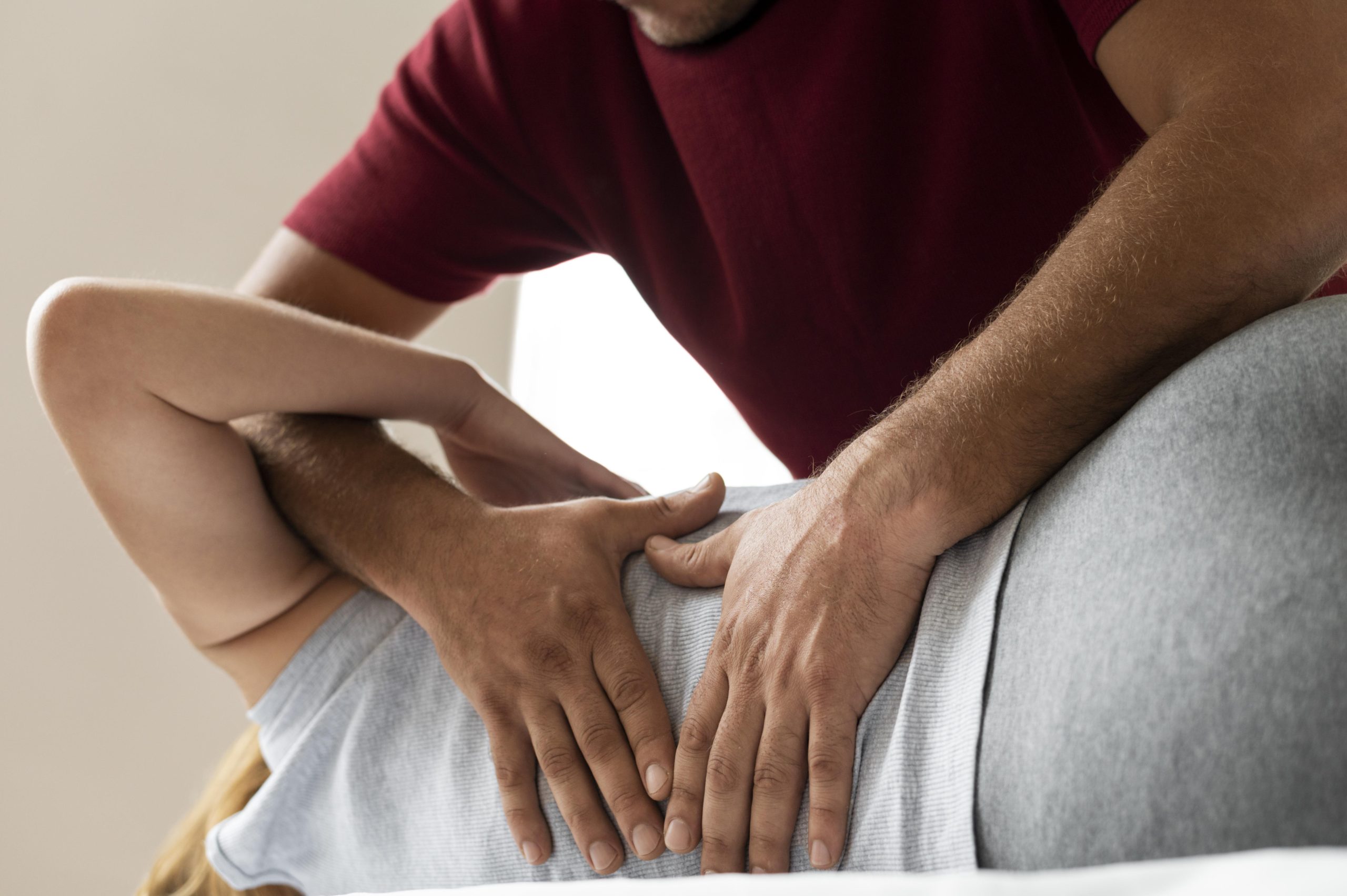 Manual therapy for sciatica being conducted.